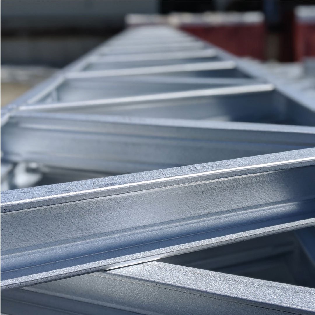 Close-up of galvanized cold-formed steel framing components