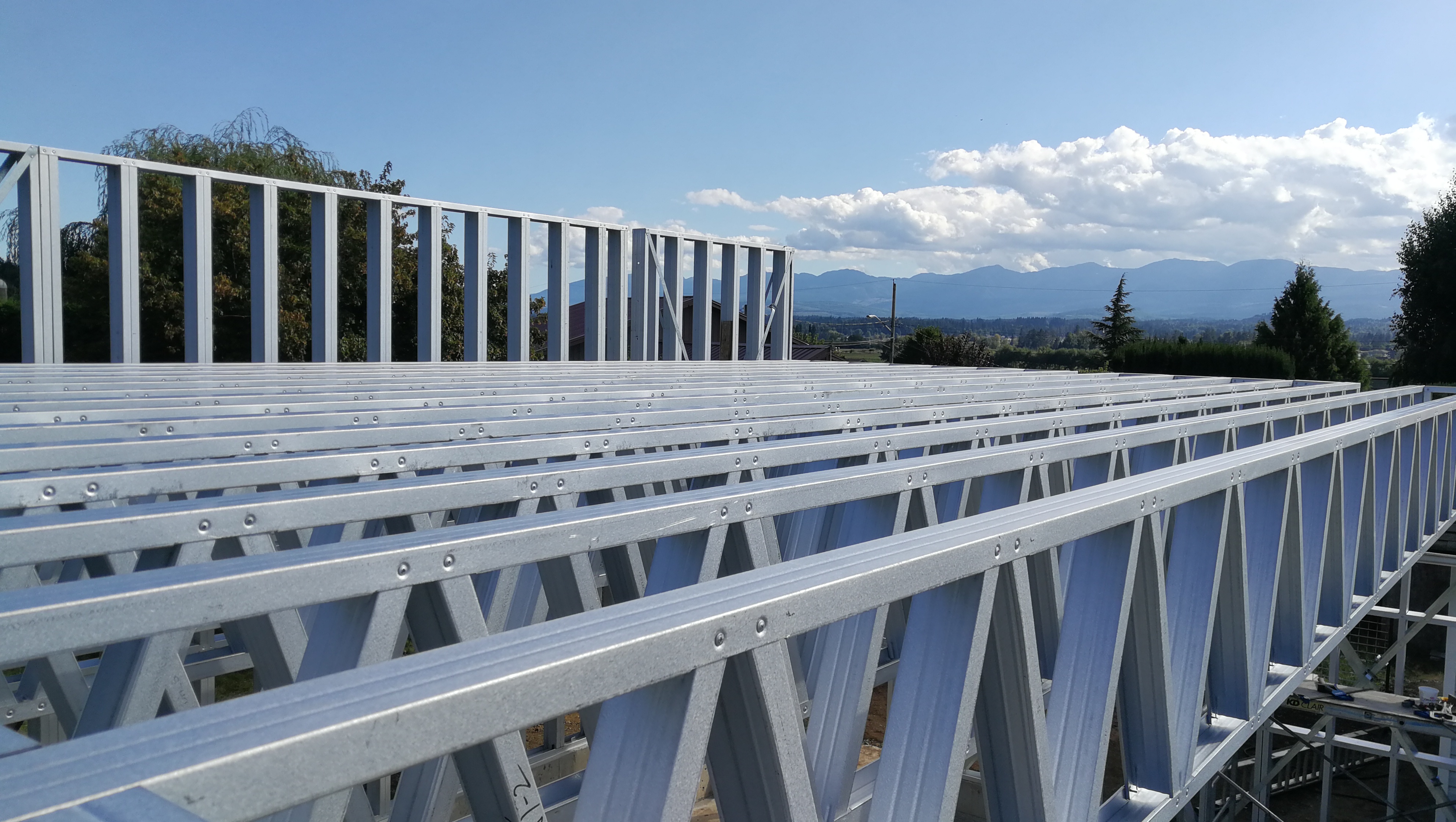 Steel floor joist system installed with mountain landscape